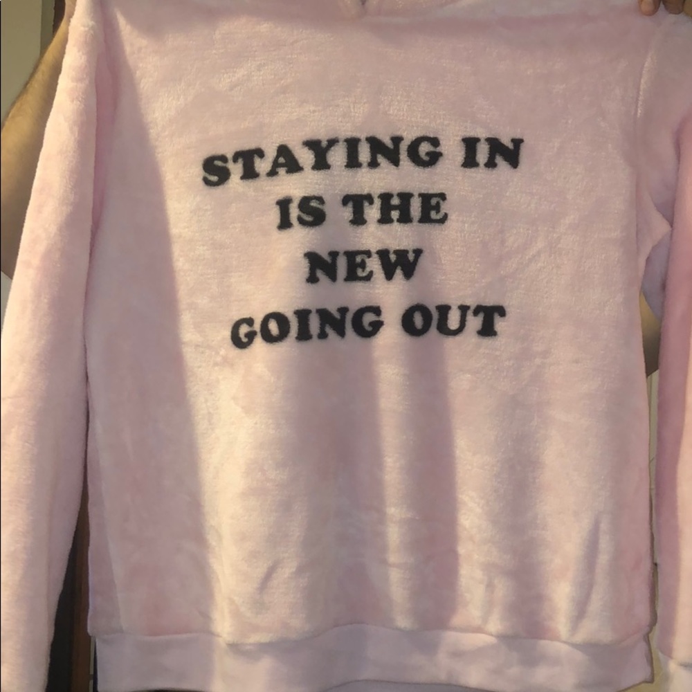 “Staying in is the new going out” fuzzy sweatshirt